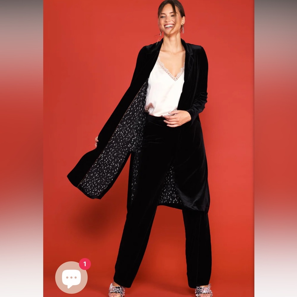 Black velvet duster coat with pockets. In perfect condition, only worn once.